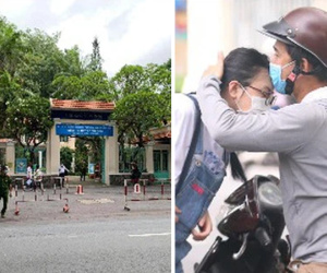 Chùm ảnh: Cổng trường vắng hoe, an ninh được tăng cường tại điểm thi có thí sinh dương tính với COVID-19
