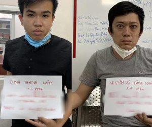Bí mật của 2 kẻ mặc đồ bảo hộ ngồi trên ôtô ở TP HCM
