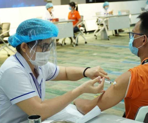 Người lao động được tiêm vắc xin, ở trọ, xét nghiệm... miễn phí khi trở lại TPHCM