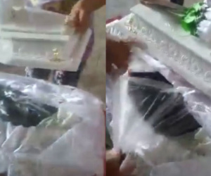 Mở quan tài con gái sơ sinh trước khi chôn cất, bố mẹ hãi hùng không thể tin nổi vào mắt mình trước cảnh tượng quá xúc phạm