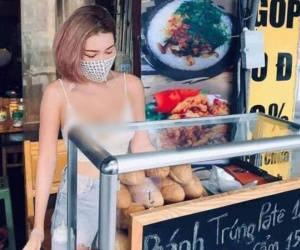 Cô chủ quán nóng bỏng đứng bán bánh mì làm dân mạng 'chao đảo'