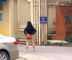 Nữ khách hàng cởi quần đứng chửi bới trước cổng trụ sở Bưu điện tỉnh Nghệ An