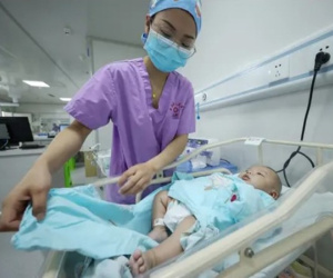Truyền thông nhà nước Trung Quốc đăng bài đề nghị Đảng viên sinh 3 con
