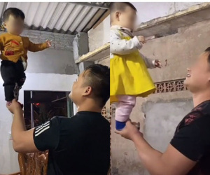 Hoảng hồn cảnh bố nâng con gái 9 tuổi bằng 1 tay, dân tình nhắc nhở còn 'cãi chày cãi cối'