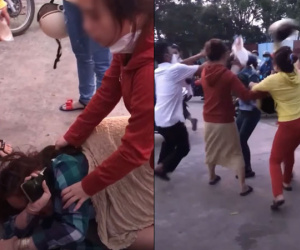 Clip: Bị nhóm phụ nữ đấm đá, dùng mũ bảo hiểm phang tới tấp, cô gái trẻ liên tục phủ nhận: 'Tôi không quen chồng chị'
