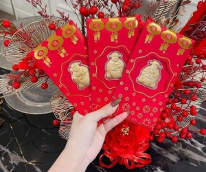 Lì xì thần tài mạ vàng 24k tài lộc đắt khách, loạn giá chợ mạng