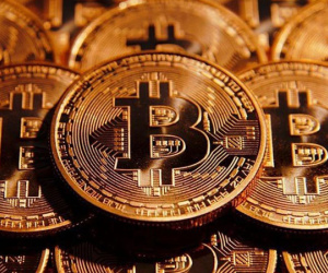 Vàng chững lại, Bitcoin bật tăng sau thông tin Fed tăng lãi suất