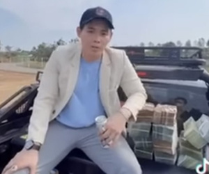 Thanh niên rải tiền 'cho đất ăn' để làm giàu thừa nhận quay clip... cho vui và câu view