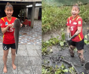 Hình ảnh nhà vô địch SEA Games 31 - Chương Thị Kiều lội bùn, bắt cá ở quê gây sốt dân mạng
