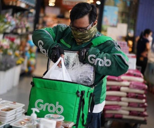 Grab thu phí nắng nóng: Tận thu mồ hôi của tài xế!