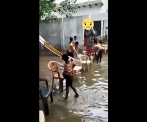 Cô giáo gây phẫn nộ khi bắt học sinh chịu ngập để làm cầu cho mình vào lớp