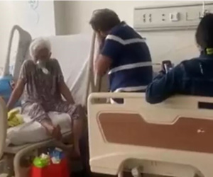 Vào chăm mẹ nằm viện, con trai nói 1 câu khiến ai cũng phải khóc