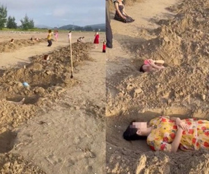Nhóm du khách đào hố cát 'nằm thiền' trên bãi biển: 'Các hố cát đào sẵn rồi lấp lại, chỉ trừ phần mũi để thở'