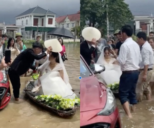 Đám cưới ngày mưa lũ, chú rể Nghệ An dùng thuyền rước dâu