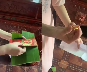 Cô dâu mướt mồ hôi, bóc mỏi tay mới lấy được quà mừng trong bọc lá chuối của bạn thân
