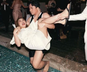 Hari Won giận dỗi khi thấy Trấn Thành thân thiết với cô gái khác trong đám cưới Diệu Nhi