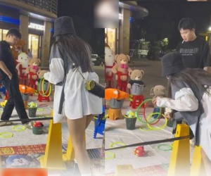 Sốt ruột vì cô gái ném vòng mãi không trúng, chủ quán 5 lần 7 lượt giảm độ khó, thiếu điều dâng con gấu bông vào trước mặt mà khách nữ vẫn 'game over'