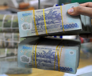 Ngân hàng Nhà nước bơm ròng 74.000 tỷ đồng, lãi suất qua đêm lên 7%/năm