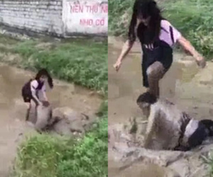 Nữ sinh lớp 8 bị đánh đập dã man, nhấn xuống bùn vì 'không chào các chị khoá trên'