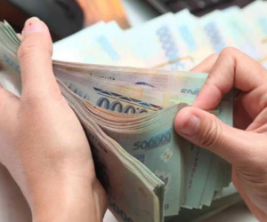 Đi làm ngày Tết, người lao động được trả lương ra sao?