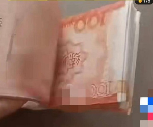 Bạn thân đưa tiền trả nợ, cô gái 'chết lặng' khi mở ra kiểm tra