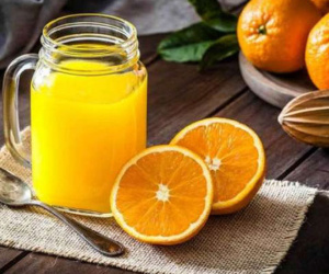 Có nên uống nước cam trước khi ăn?