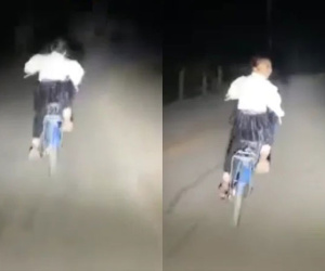 Có lòng tốt soi đèn giúp em nhỏ đạp xe về khuya, tài xế liền cười trừ trước phản ứng bất ngờ của cô bé