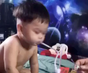 Công an truy tìm cha dượng trong clip 'bé 3 tuổi hút ma túy đá'
