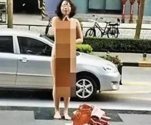 Phát hiện bạn trai ngoại tình, cô gái khỏa thân giữa thanh thiên bạch nhật rồi hét lớn: 'Anh ta lừa dối tôi'