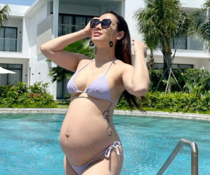 Bất chấp tranh cãi, Phương Trinh Jolie vẫn tự tin diện bikini bé xíu khoe bụng bầu 'vượt mặt' những ngày cuối thai kỳ