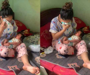 Mẹ bỉm vừa ôm con vừa khóc nức nở: 'Dỗ mãi con không nín nên khóc theo'