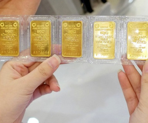 Giá vàng tăng, USD giảm nhẹ