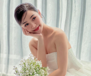 Quỳnh Kool bất ngờ đăng ảnh cưới, giấu mặt chú rể