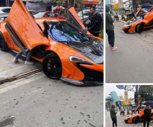 Camera vụ siêu xe McLaren 650s gặp nạn, nằm bên vỉa hè Hà Nội