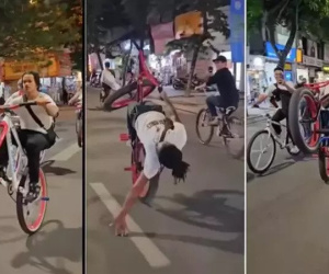 Nhóm người nước ngoài đi xe đạp bốc đầu, đánh võng trên đường phố Hà Nội