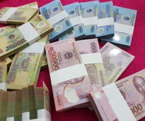 Đổi tiền lẻ, tiền mới 'ăn' chênh lệch dịp Tết Nguyên đán có bị phạt không?