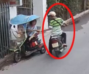 Clip gây phẫn nộ: Người đàn ông giật hàng trăm tờ vé số của người khuyết tật giữa ban ngày