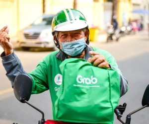 Grab lần đầu có lãi