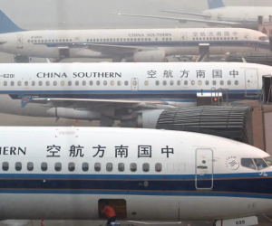 Chuyến bay Trung Quốc bị hoãn 4 tiếng do hành khách ném đồng xu và động cơ để cầu may