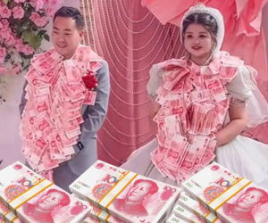 Cô dâu chú rể được tặng vòng hoa tiền lên tới 500 triệu đồng từ các chị gái