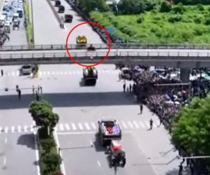 Công an vào cuộc vụ tài xế xe máy phi lên cầu vượt lúc đoàn xe linh cữu Tổng Bí thư đi qua