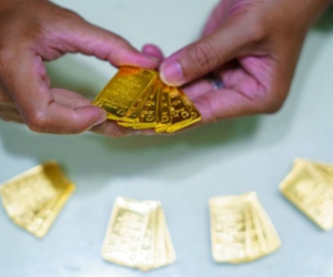 Vì sao Công ty SJC tạm ngưng mua vàng miếng loại một chữ?