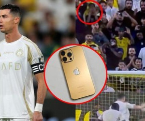 Ronaldo đền iPhone mạ vàng cho fan nhí bị sút bay điện thoại
