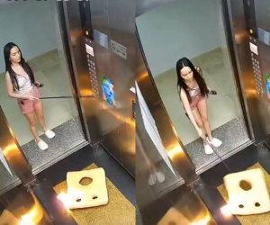 Xôn xao cô gái ném vật cháy vào thang máy chung cư, có hành động khó tin khiến công an phải quấn chăn đưa về trụ sở