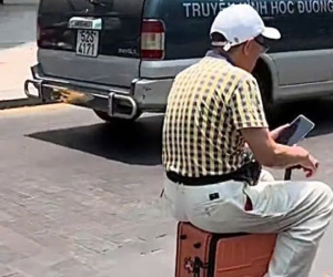 Đã xác định người đàn ông cưỡi vali ở trung tâm TP HCM