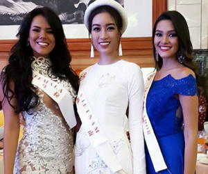 Mỹ Linh mặc áo dài, đội mấn dự tiệc tại Miss World