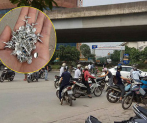 Hà Nội: Hàng chục xe máy nổ lốp tập thể vì đinh rơi vãi trên đường Nguyễn Xiển