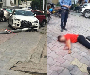 Hà Nội: Xe sang húc cột đèn, cột đèn đổ vào đầu người dân đang đi bộ trên vỉa hè
