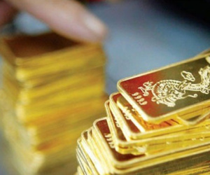 Vàng giảm giá, gia tăng áp lực lên kim loại quý