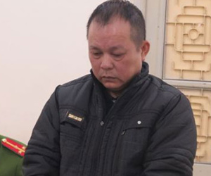 Bị bắt quả tang khi đang ôm cả ba lô ngoại tệ giả, chờ giao dịch